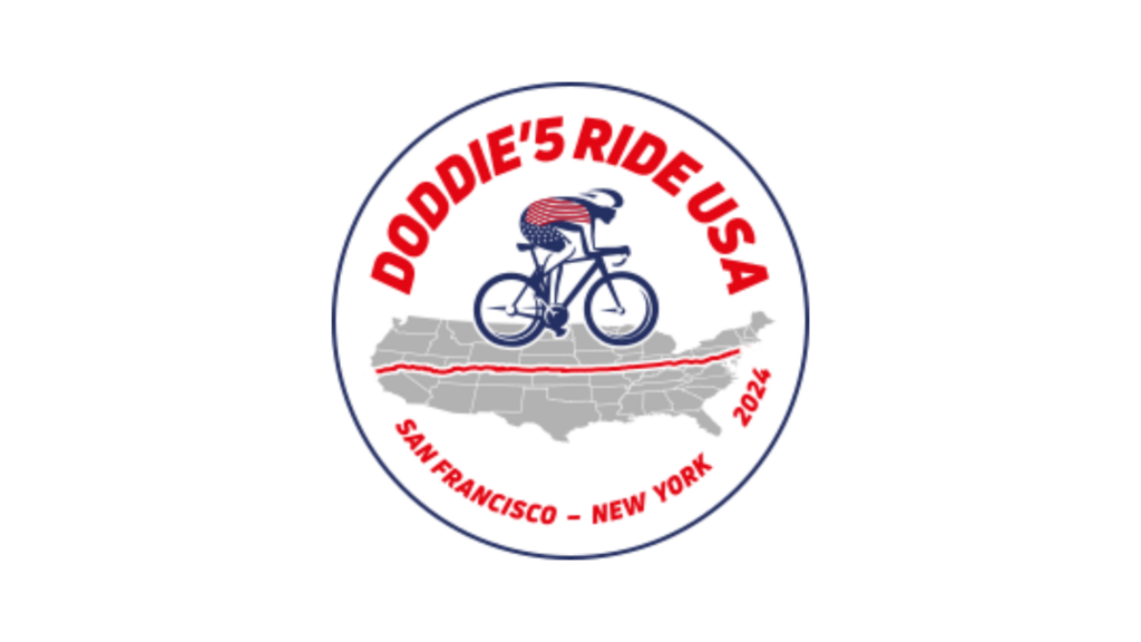 Doddie'5 Ride USA, San Francisco - New York, 2024 written in red font. Image features a man cycling on a bike across map of North America, travelling from West to East.
